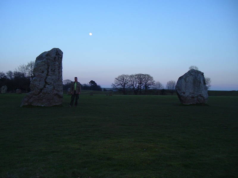 The full Moon rises above the Avebury stone circle.