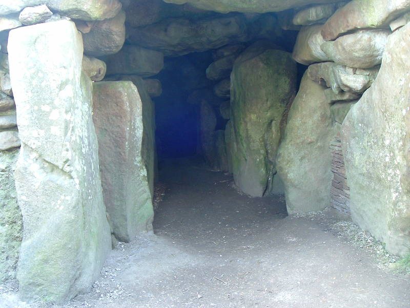 It gets dark as you enter the megalithic interior of the West Kennet Long Barrow.