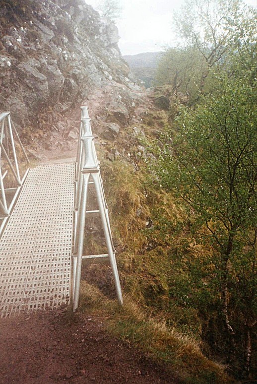 Metal footbridge while ascending Meall an t-Suidhe.