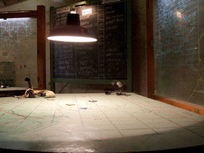 Plotting boards tracking Nazi and Allied aircraft.
