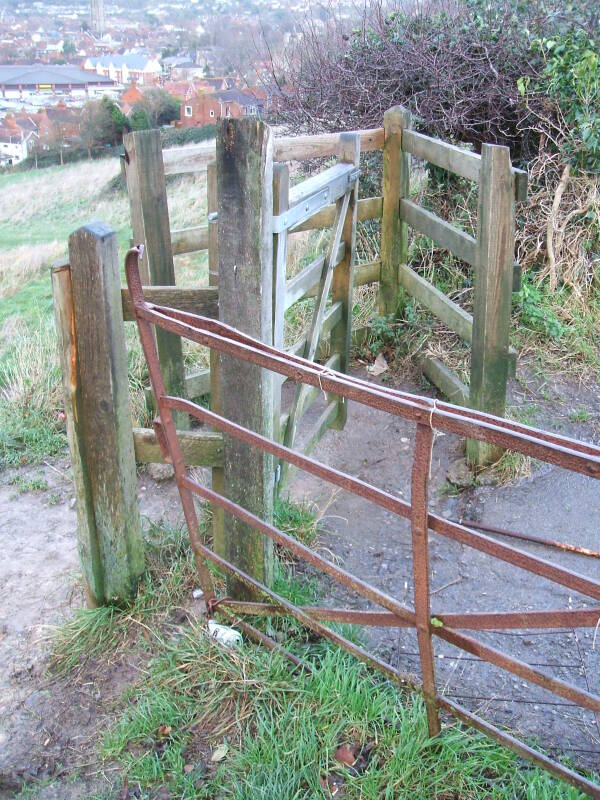 A typical gate along a muddy path from Wearyall Hill to the Glastonbury Tor.