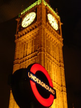 Roundrel sign for The Tube or the London Underground in front of Big Ben.