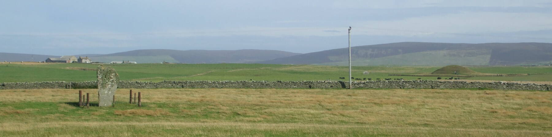 Orkney Islands, north of Scotland:  Barnhouse standing stone and Maeshowe chambered cairn and passage tomb.