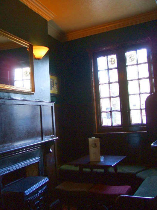 The Eagle and Child pub, Oxford, where C.S. Lewis and J.R.R. Tolkien met with the 'Inklings' literary group.  Interior of the pub, table at the front window.