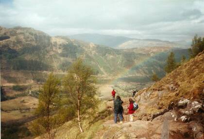 People ascending Ben Nevis near Fort William in Scotland, the highest peak in the Scottish Highlands and in all of Britain.