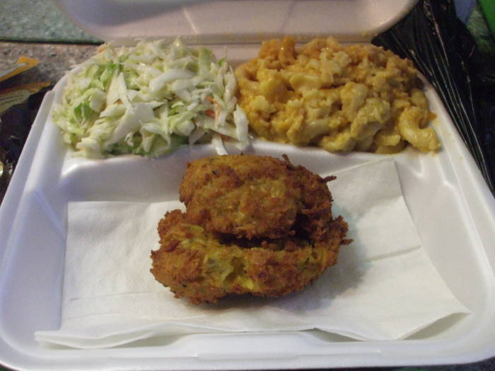 Crab cake with cole slaw and macaroni and cheese at the Market Seafood within the Lexington Market in Baltimore.