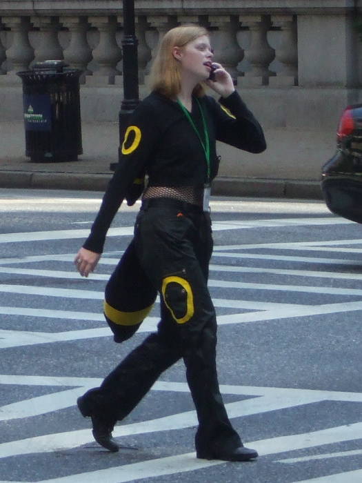 Black and yellow fox girl cosplay at Otakon anime and manga conference in Baltimore.