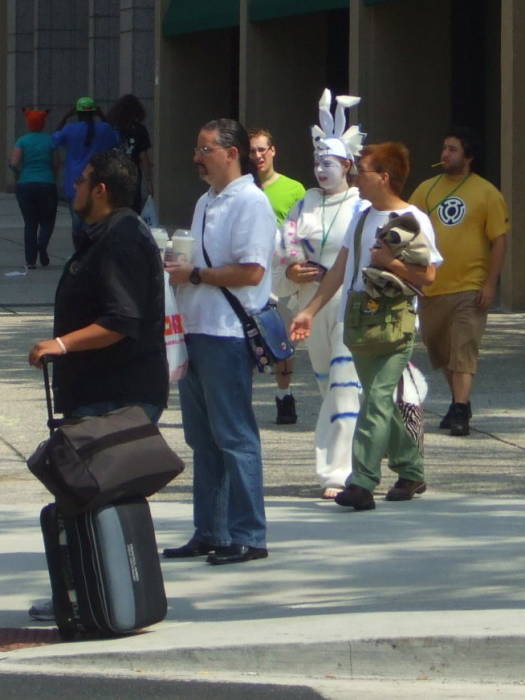 Strange all white cosplay at Otakon anime and manga conference in Baltimore.
