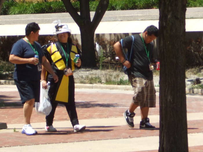 Black and yellow cosplay at Otakon anime and manga conference in Baltimore.