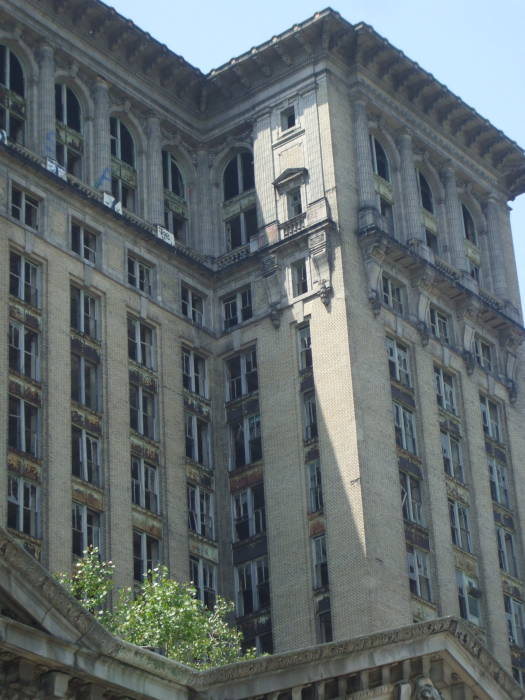 Broken windows and architectural details on Detroit's Michigan Central Station.