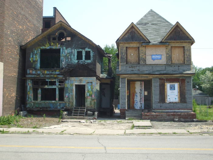 Two abandoned houses near Detroit's Michigan Central Station.