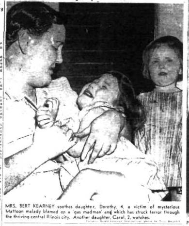 Mattoon Daily Journal-Gazette picture 'MRS. BERT KEARNEY soothes daughter, Dorothy, 4, a victim of mysterious Mattoon malady blamed on a 'gas madman' and which has struck terror through the thriving central Illinois city. Another daughter, Carol, 2, watches.