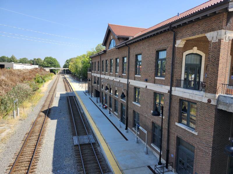 Amtrak Station platform and the CN line, formerly the Illinois Central railroad.