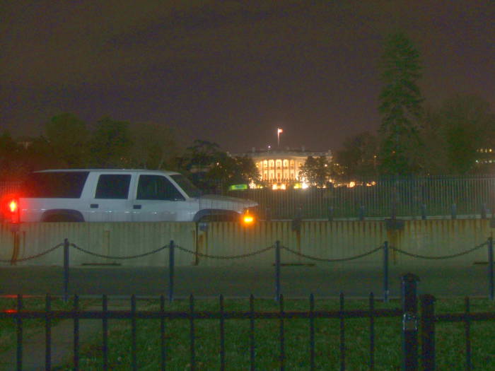 U.S. White House behind rusting barricades.