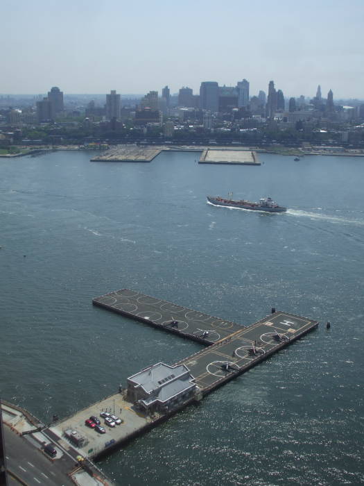 The Lower Manhattan Heliport, East River and Brooklyn as seen from Thomas Crown's office.