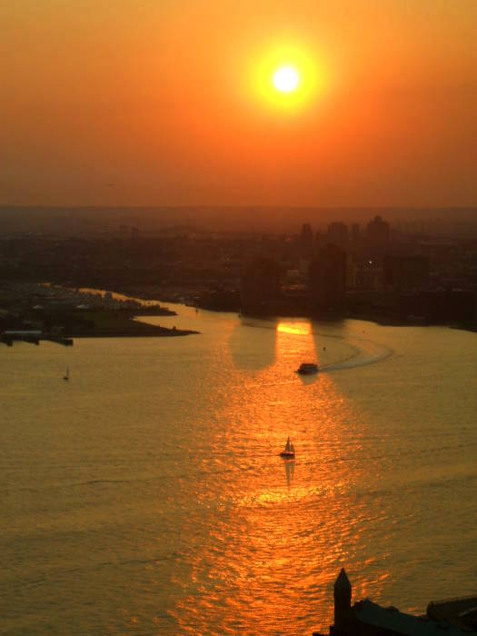 Sunset over Jersey City and the New York Harbor.