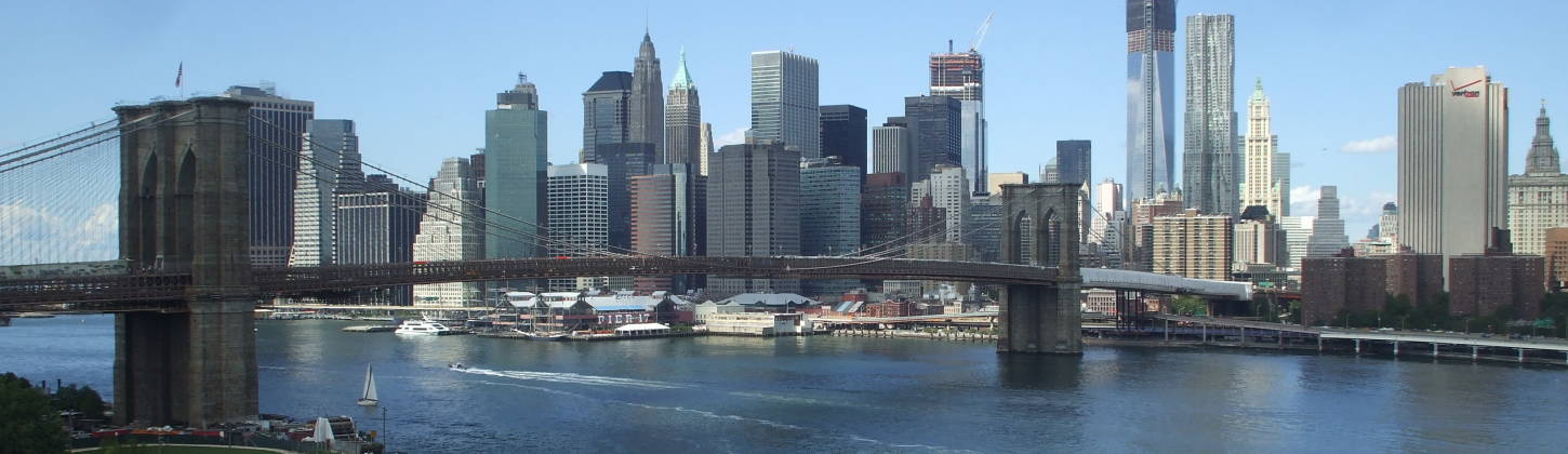 A major telecommunications switch stands at the Manhattan end of the Brooklyn Bridge.  We can see it from the Brooklyn end of the Manhattan Bridge pedestrian walkway.