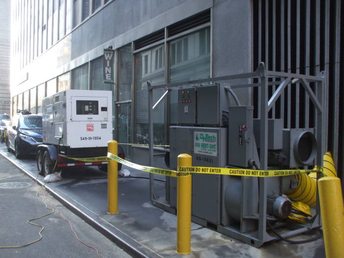 Blowers provide dry air and cooling after Hurricane Sandy in the Financial District.