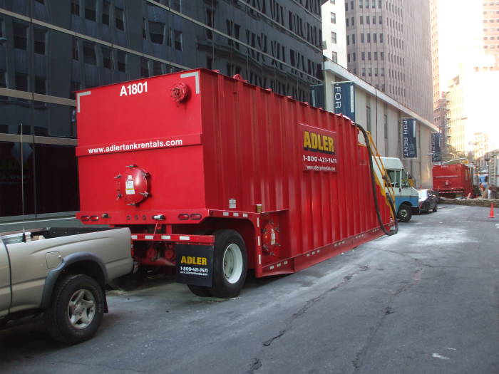 Portable tanks are used to collect water after Hurricane Sandy.