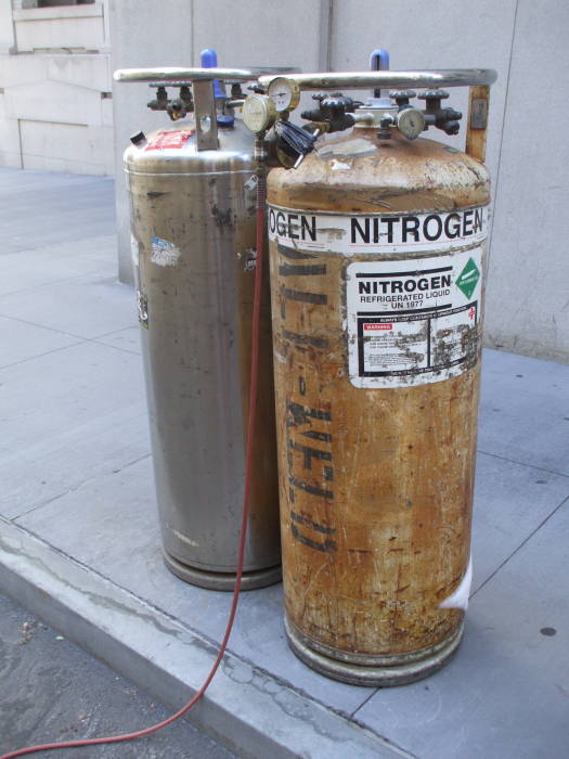Liquid nitrogen dewars stand on Nassau Street near Wall Street and the New York Stock Exchange.