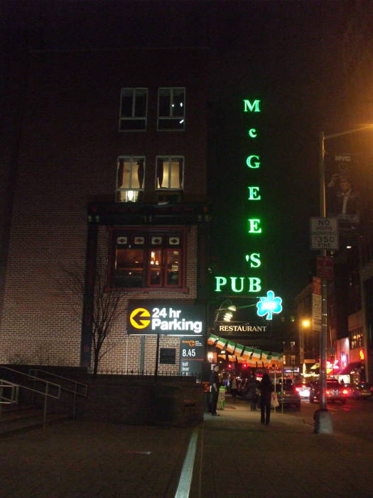 Exterior of McGee's bar in New York, model for MacLaren's in 'How I Met Your Mother'.  Night time view looking west along 55th Street.