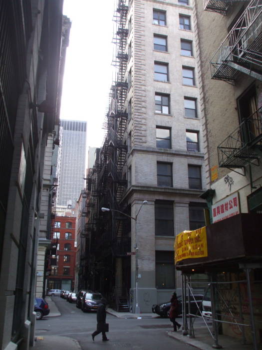 Looking north across Walker Street up Cortlandt Alley.