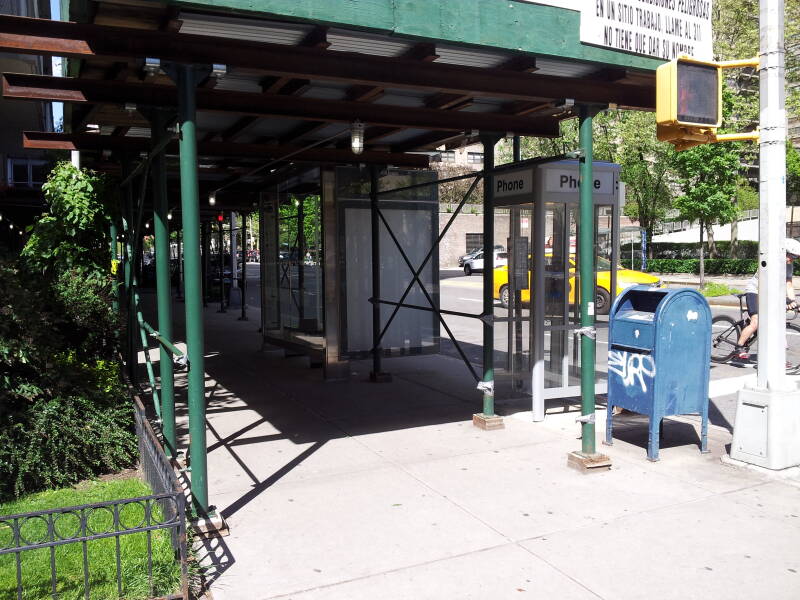 'Superman-style' full-height phone booth, one of the last 4 in Manhattan, at West End Avenue and 66th Street.