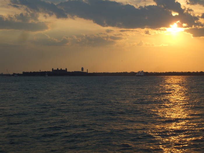 At the end!  At the Battery, Statue of Liberty and Ellis Island, Port of New Jersey in the background.