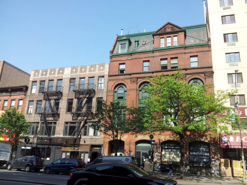 220 Bowery, the former Prince Hotel and then the Bowery House in the 2010s, the former YMCA where William S. Burroughs lived is the more elaborate building on the right.