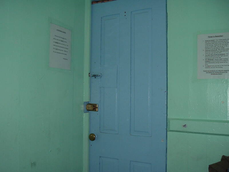 My cabin at the White House, light blue door with a deadbolt lock.