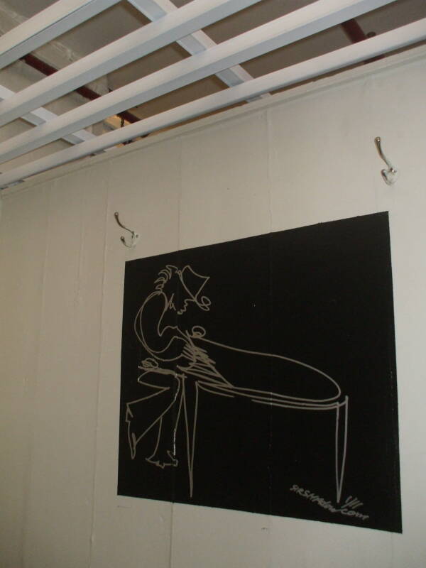 Artwork by 'Sir Shadow' in a 'cabin' in the White House SRO hotel and hostel, March 2011.