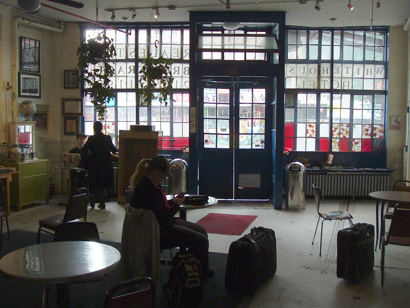 Looking out toward the street in the lobby of the Whitehouse SRO hotel and hostel.