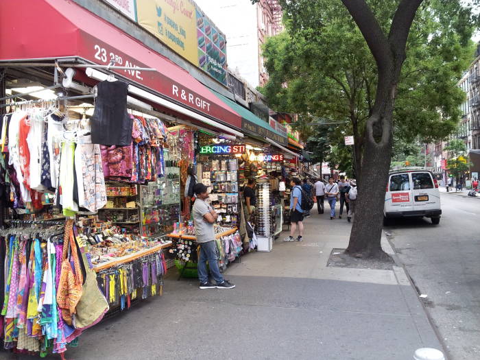 Vendors at their open-fronted stores near Third Avenue.  North side of St. Marks Place, 3rd Avenue to 2nd Avenue.