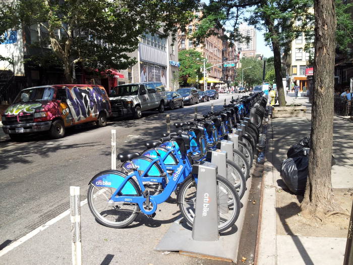 Line of CitiBike rental bicycles on the south side of St. Marks Place between 2nd Avenue and 1st Avenue in the East Village.