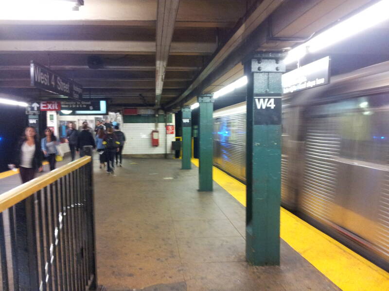 A subway train leaves the West 4th Street Washington Square Station on the New York MTA.