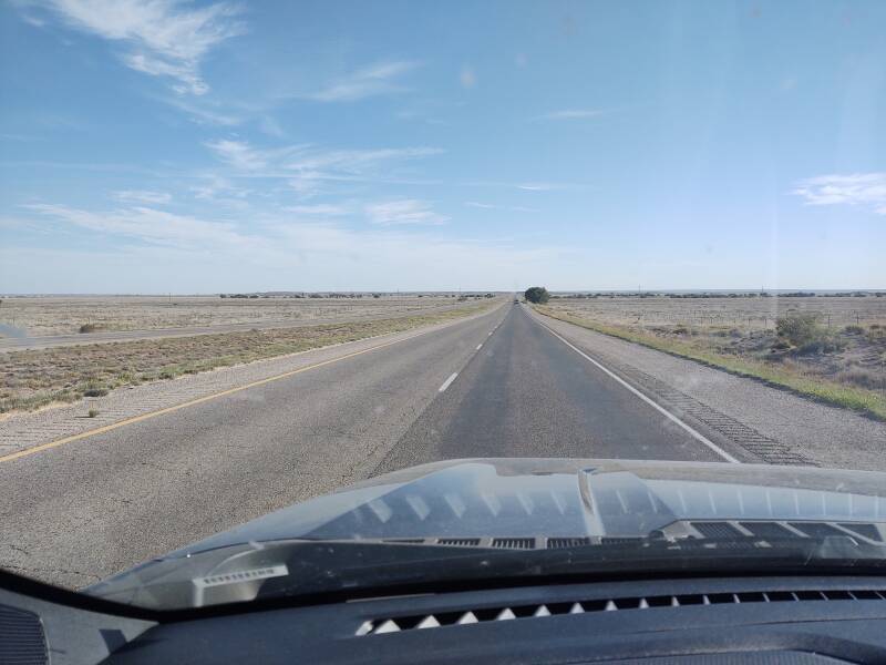 View out the windshield driving northeast on US 70 out of Roswell.