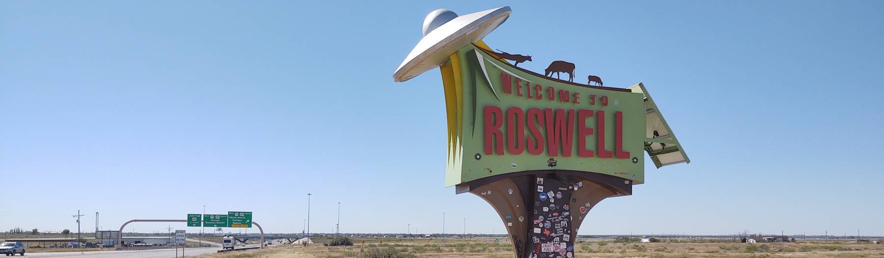 'Welcome to Roswell' sign beyond the north edge of town.