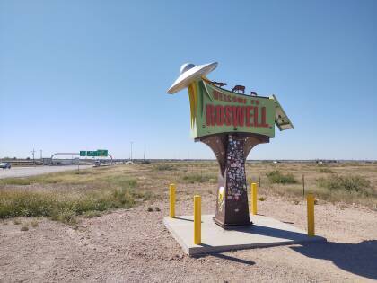 'Welcome to Roswell' sign along the U.S. 285 highway north of Roswell, New Mexico.