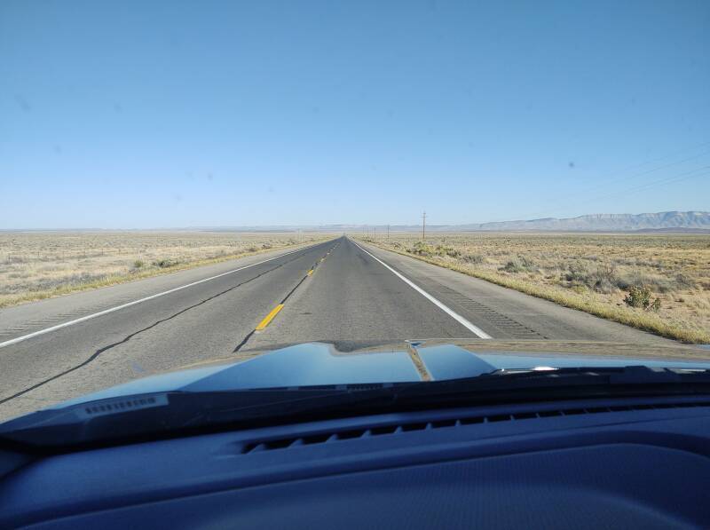 Bleak open terrain along U.S. 380 across the north end of WSMR approaching the Oscura Mountains.