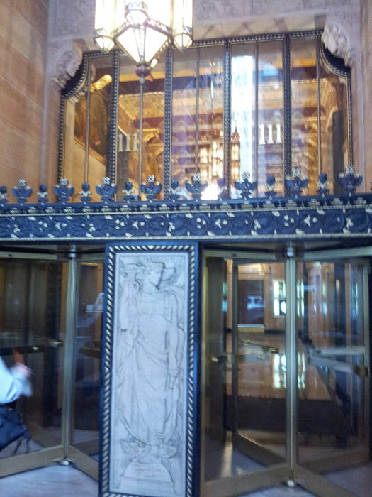 Looking through the revolving doors into the lobby of 111 Sutter Street in San Francisco, where Spade and Archer detective agency was located.