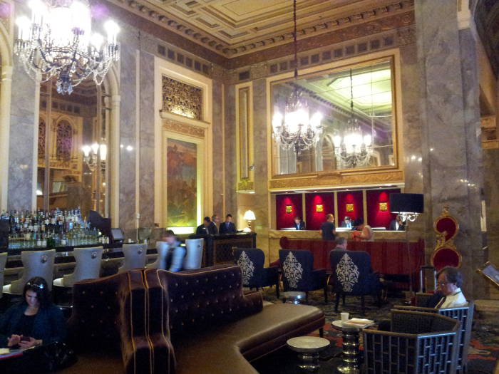 The bar and front desk in the lobby of the Sir Francis Drake Hotel.