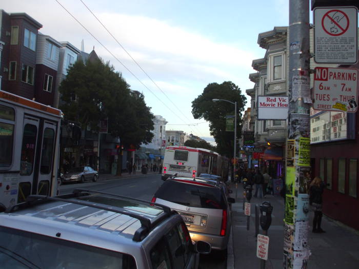 Bus stop and movie theatre.  Haight Street, between its west end at Golden Gate Park and Mission Street.