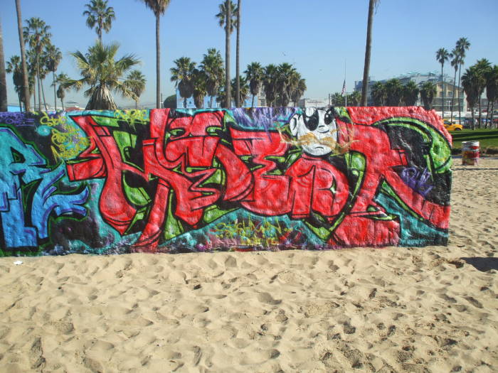 Graffiti art on the beach in Venice, California.