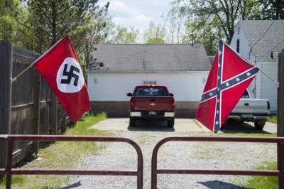 Neo-Confederate Donald Trump supporter flying both Nazi and Confederate flags.