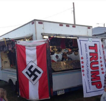 Donald Trump supporter selling Nazi banners.